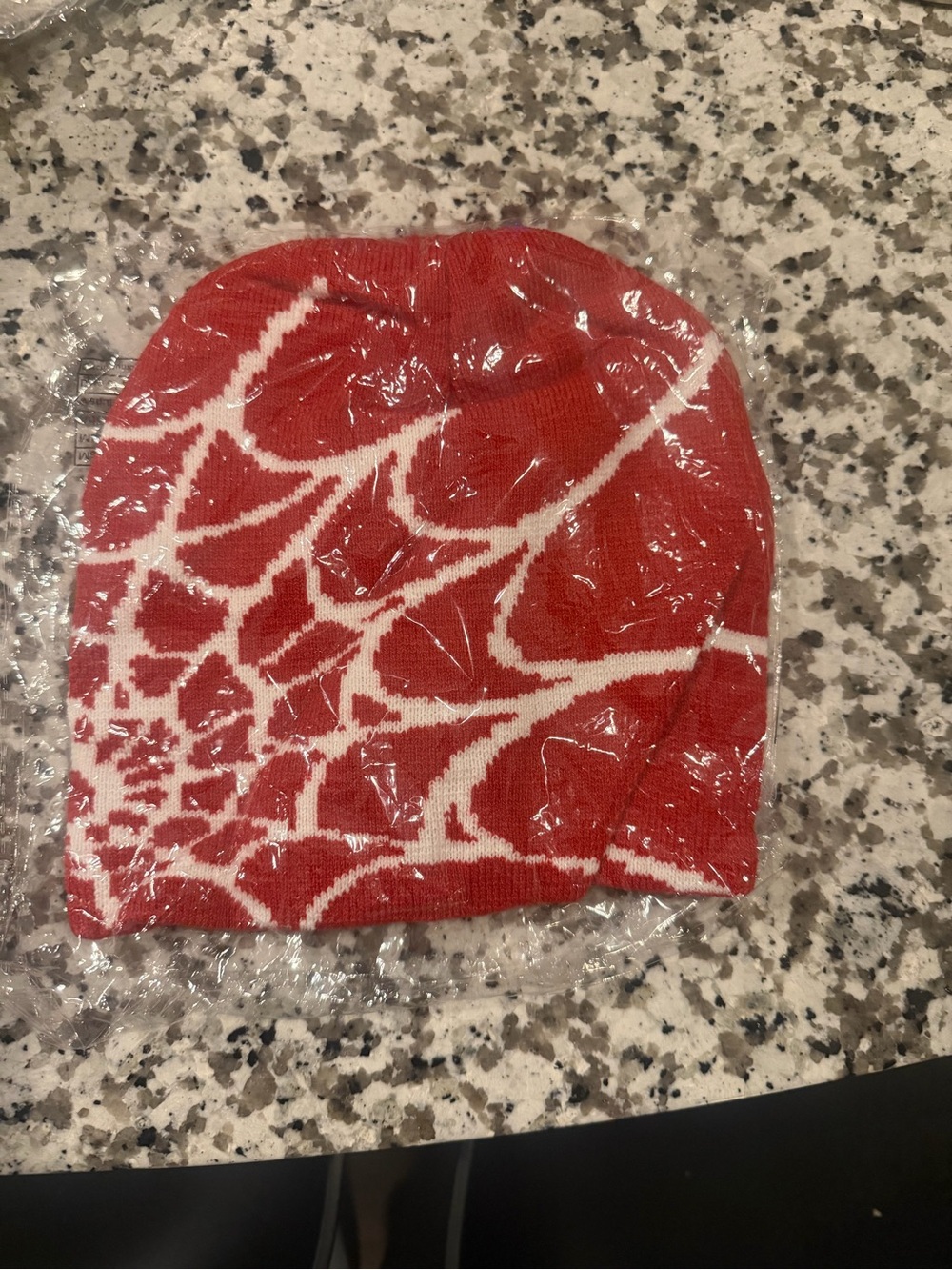 Red and White Patterned Beanie Hat